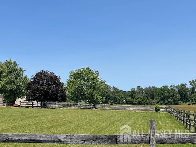 55 B Davidson's Mill Road, Unit B North Brunswick, NJ 08902 - Photo 7 of 8 a view of a swimming pool with a yard