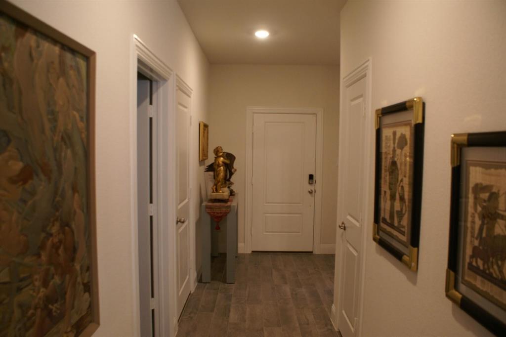 11132 Ranchera Drive Aubrey, TX 76227 - Photo 8 of 30 a view of a hallway with closet and a livingroom view