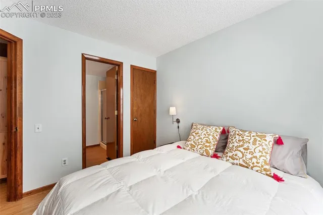 a bathroom with a sink toilet and mirror