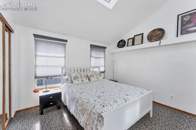 a bathroom with a toilet and shower