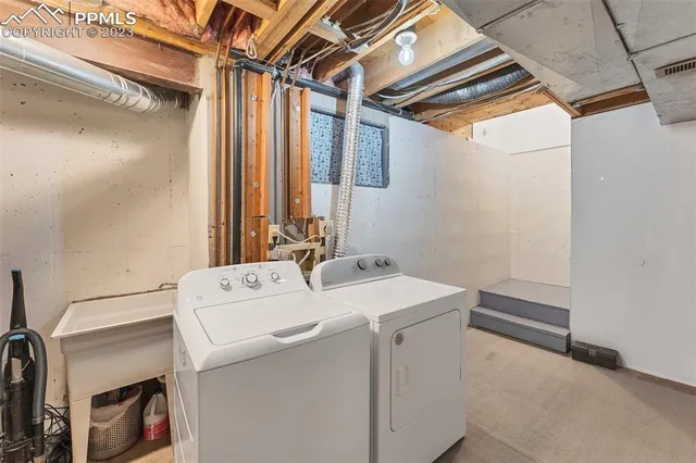 a utility room with dryer and washer