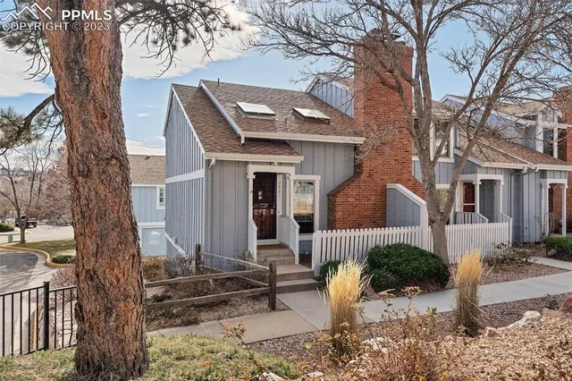 a view of house with yard