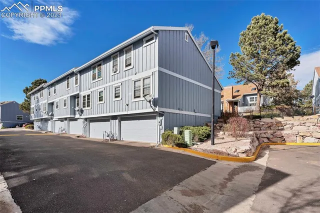 a view of a building with a street