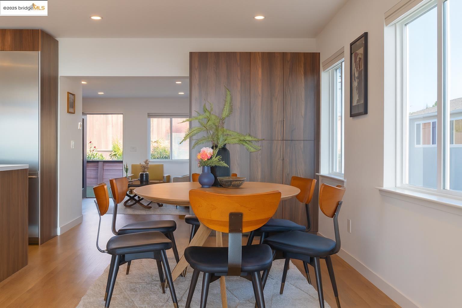 207 Cambridge Avenue Kensington, CA 94708 - Photo 13 of 47 a view of a dining room with furniture and a window