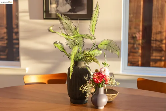 a vase of flowers sitting on a table