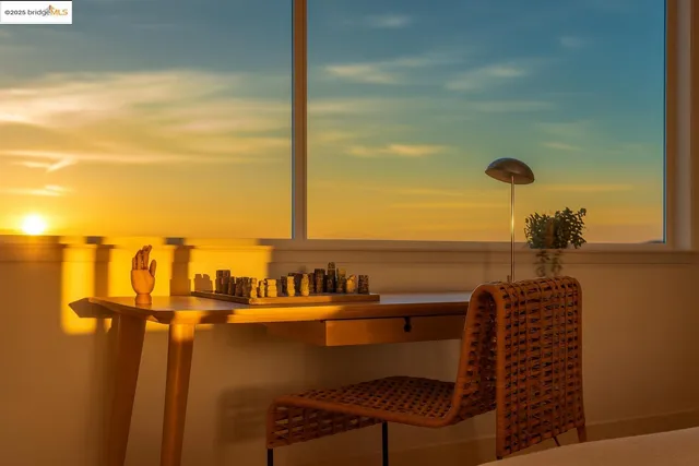 a view of a balcony with chairs