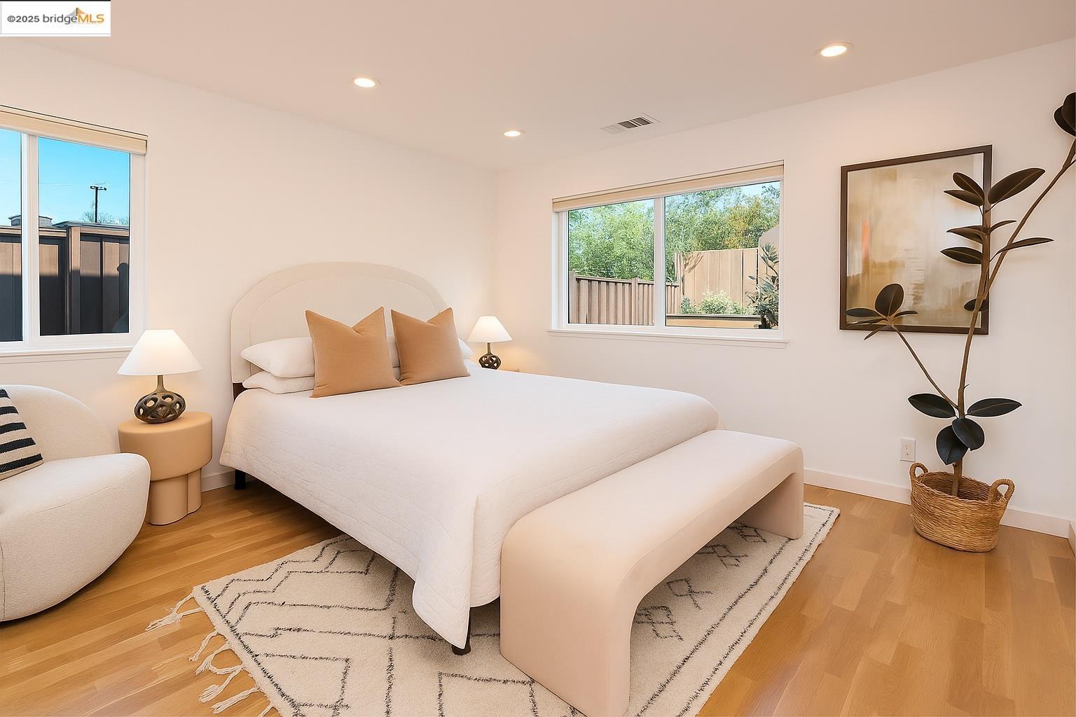 207 Cambridge Avenue Kensington, CA 94708 - Photo 29 of 47 a bedroom with a bed and a large window