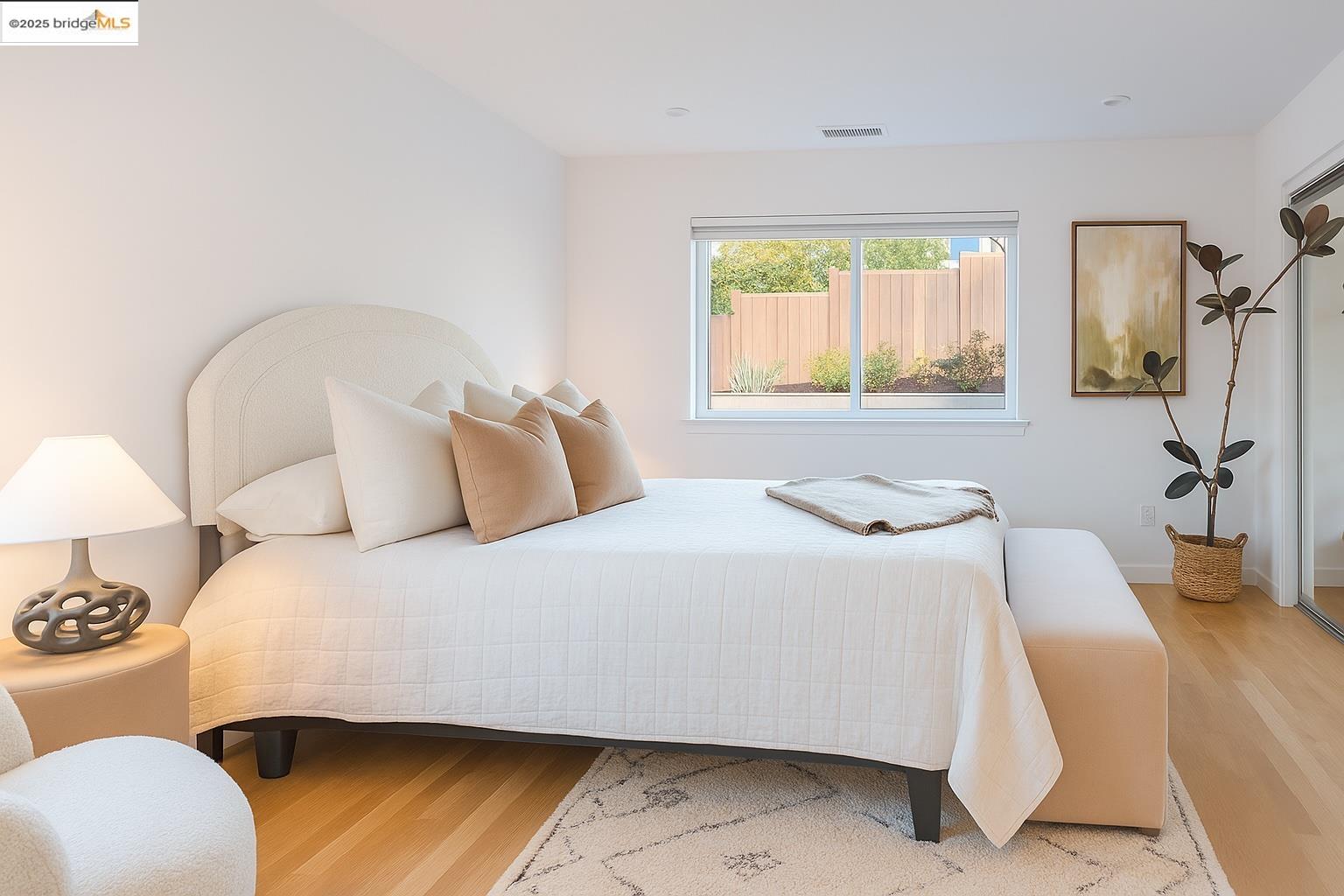 207 Cambridge Avenue Kensington, CA 94708 - Photo 30 of 47 a bedroom with a bed and a couch