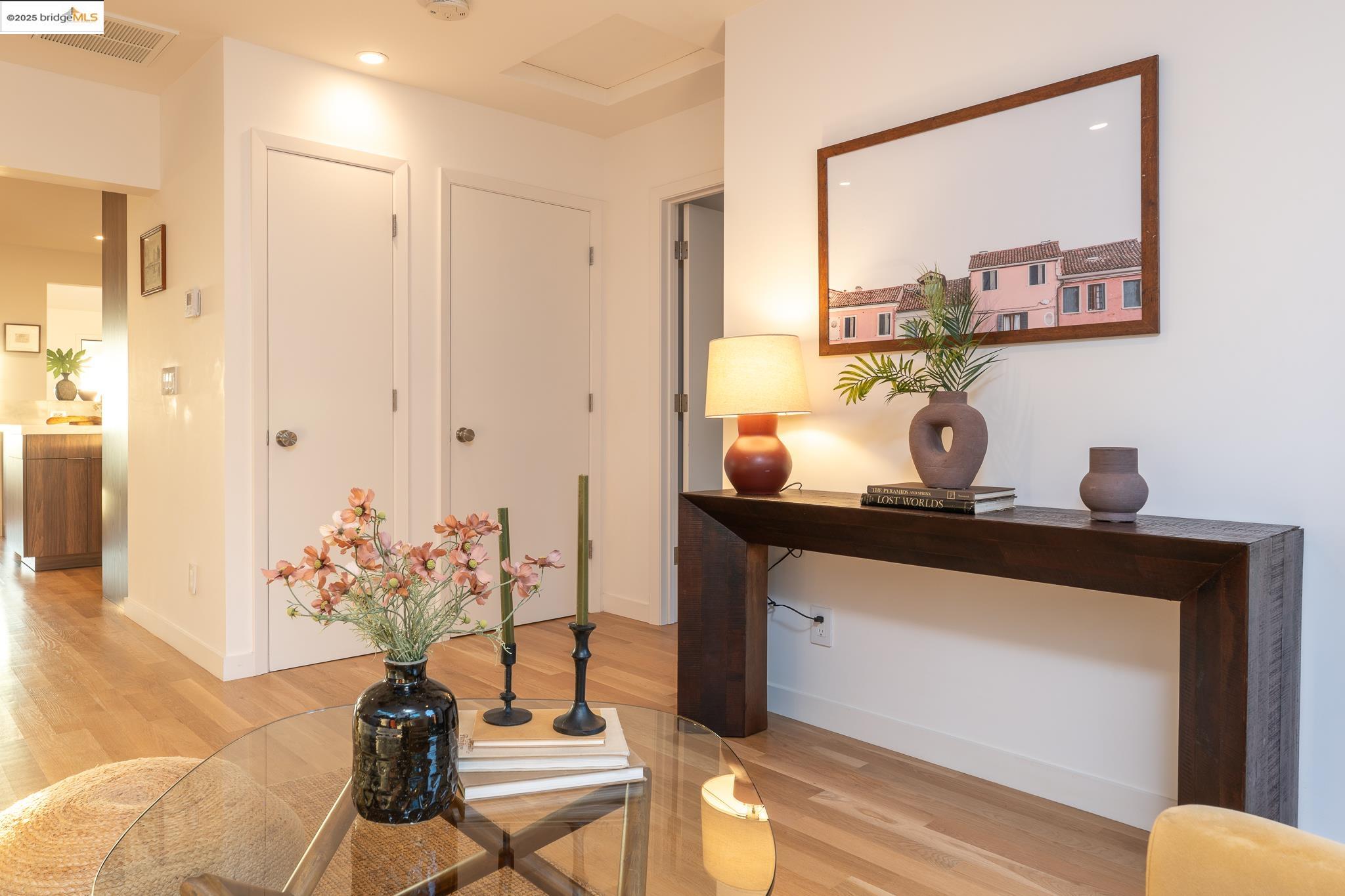 207 Cambridge Avenue Kensington, CA 94708 - Photo 33 of 47 a living room with furniture and a potted plant
