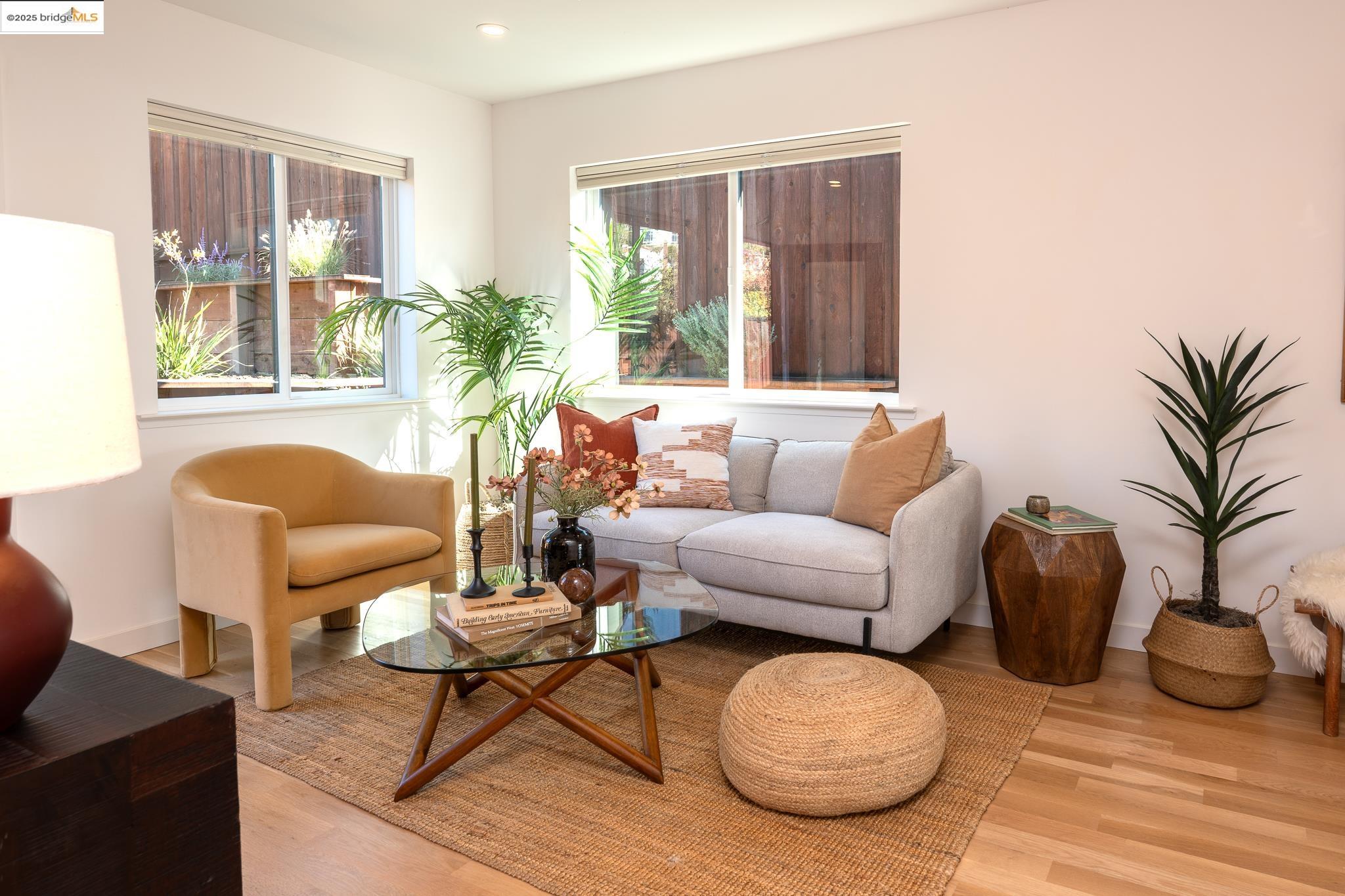 207 Cambridge Avenue Kensington, CA 94708 - Photo 35 of 47 a living room with furniture and a large window