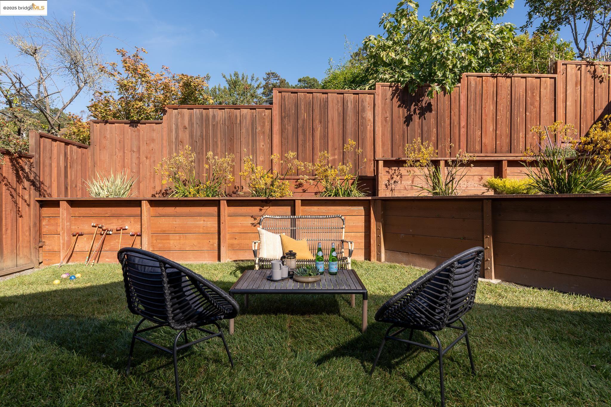 207 Cambridge Avenue Kensington, CA 94708 - Photo 36 of 47 a view of a chairs and table in patio