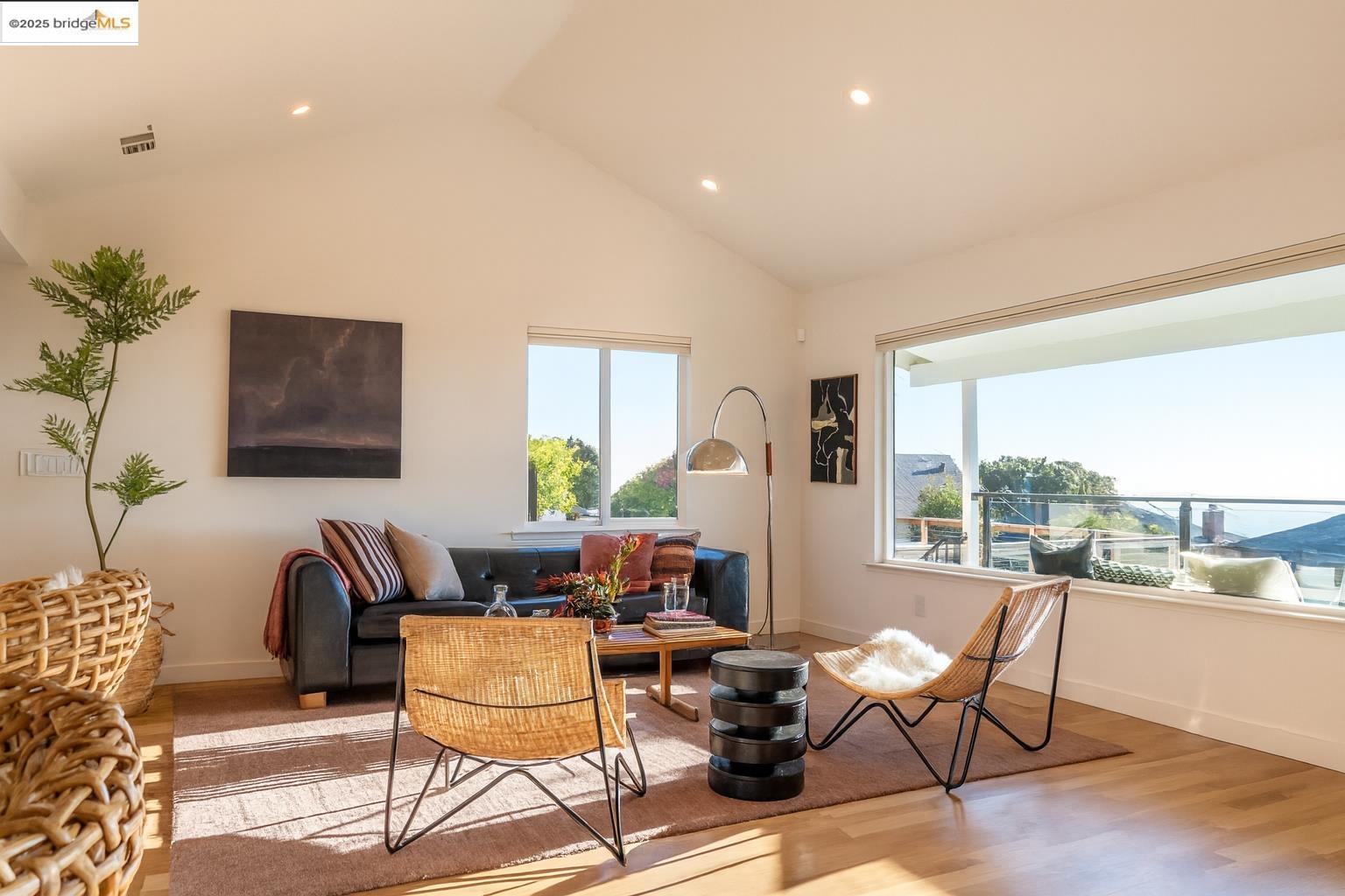 207 Cambridge Avenue Kensington, CA 94708 - Photo 8 of 47 a living room with furniture and a large window
