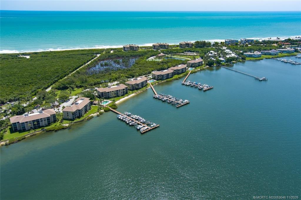 4720 Northeast Sandpebble Trace, Unit 403 Stuart, FL 34996 - Photo 2 of 40 a view of a city with ocean view