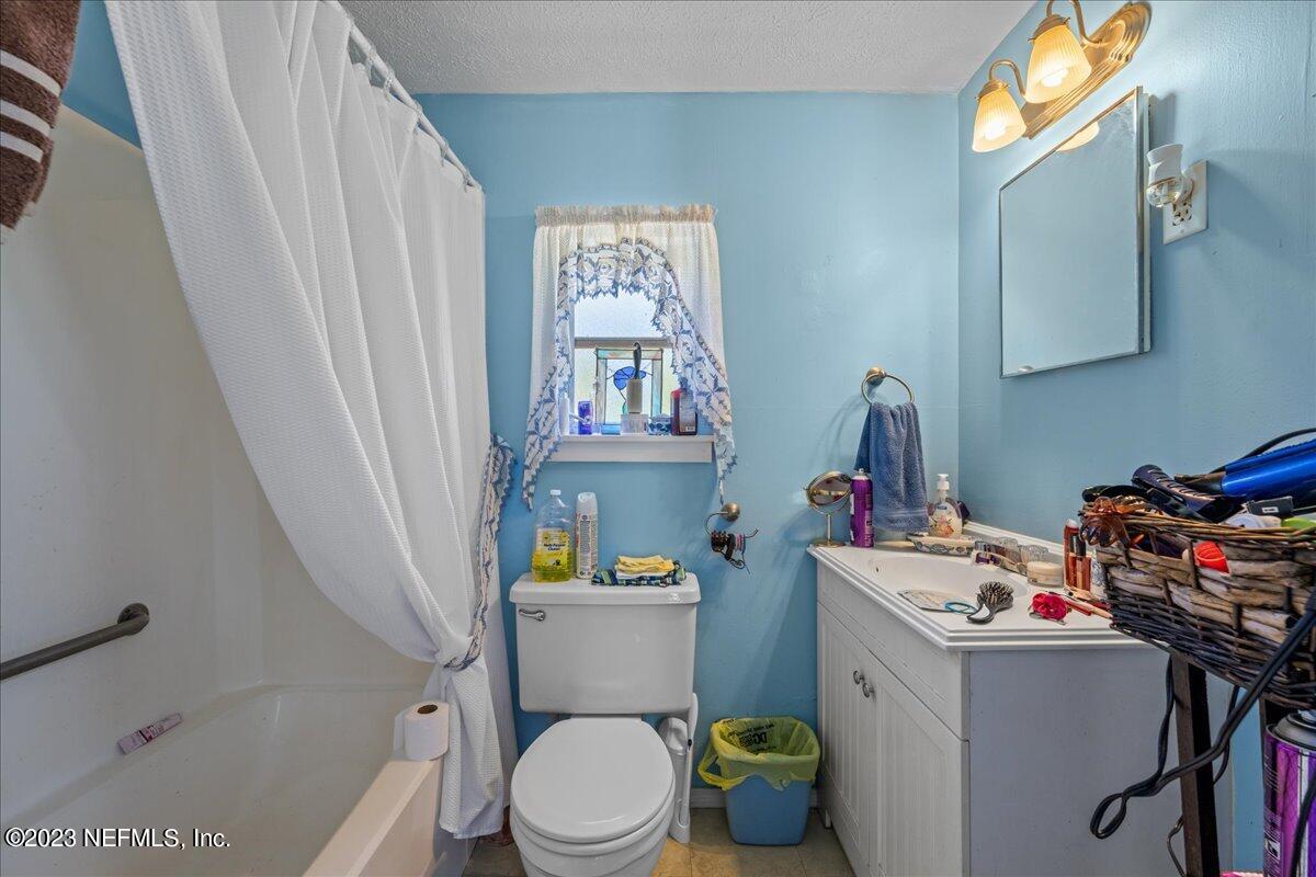 208 Tinsley Road Florahome, FL 32140 - Photo 24 of 71 a room with storage and utility