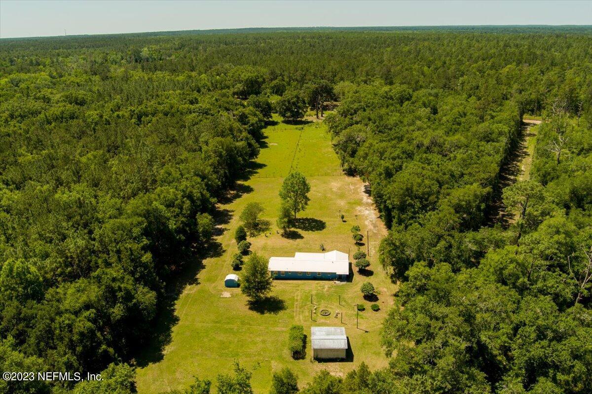 208 Tinsley Road Florahome, FL 32140 - Photo 33 of 71 an aerial view of residential houses with outdoor space