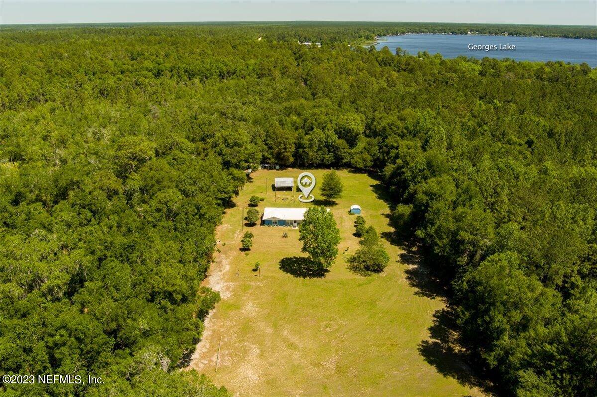 208 Tinsley Road Florahome, FL 32140 - Photo 64 of 71 a view of an outdoor space and a yard