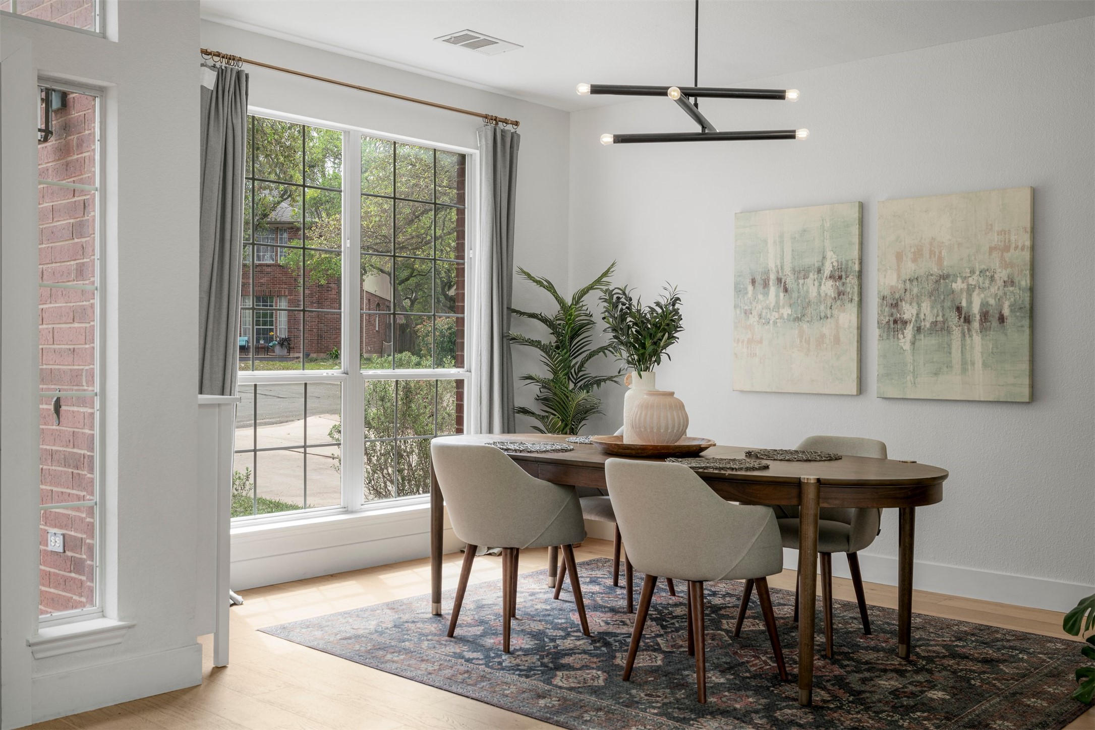 6804 Auckland Court Austin, TX 78749 - Photo 2 of 40 a view of a dining room with furniture window and outside view
