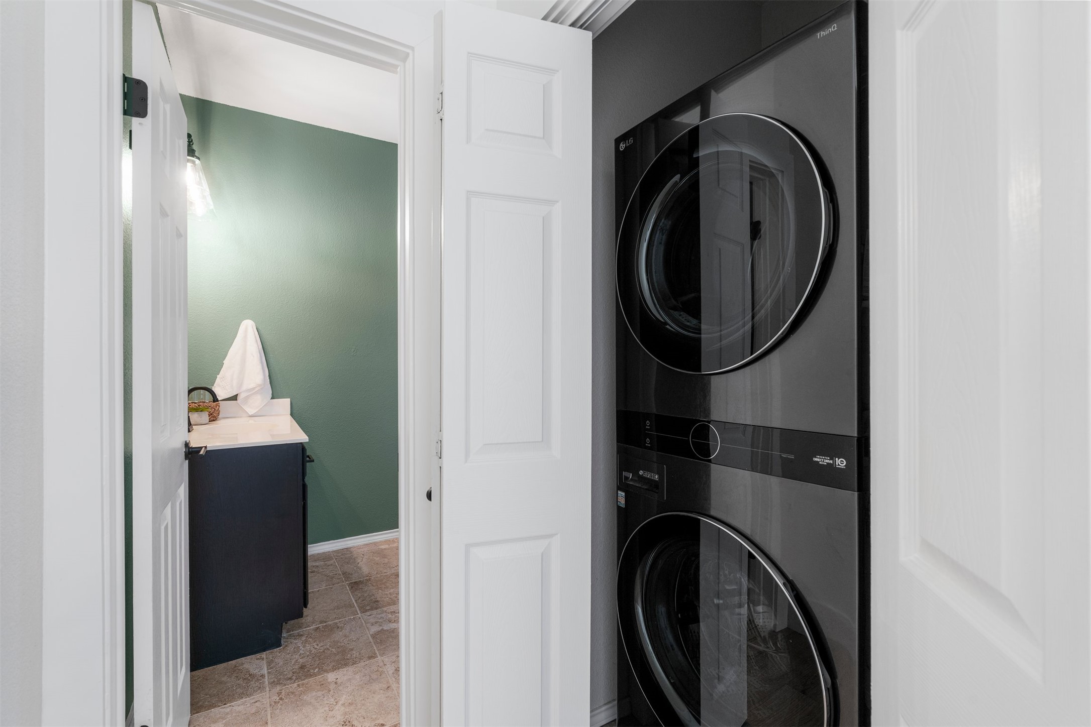 6804 Auckland Court Austin, TX 78749 - Photo 27 of 40 a close view of a utility room with dryer and washer