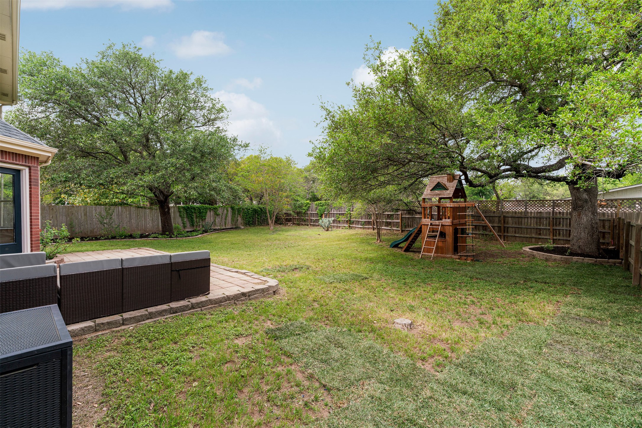 6804 Auckland Court Austin, TX 78749 - Photo 37 of 40 a view of a garden with a slide