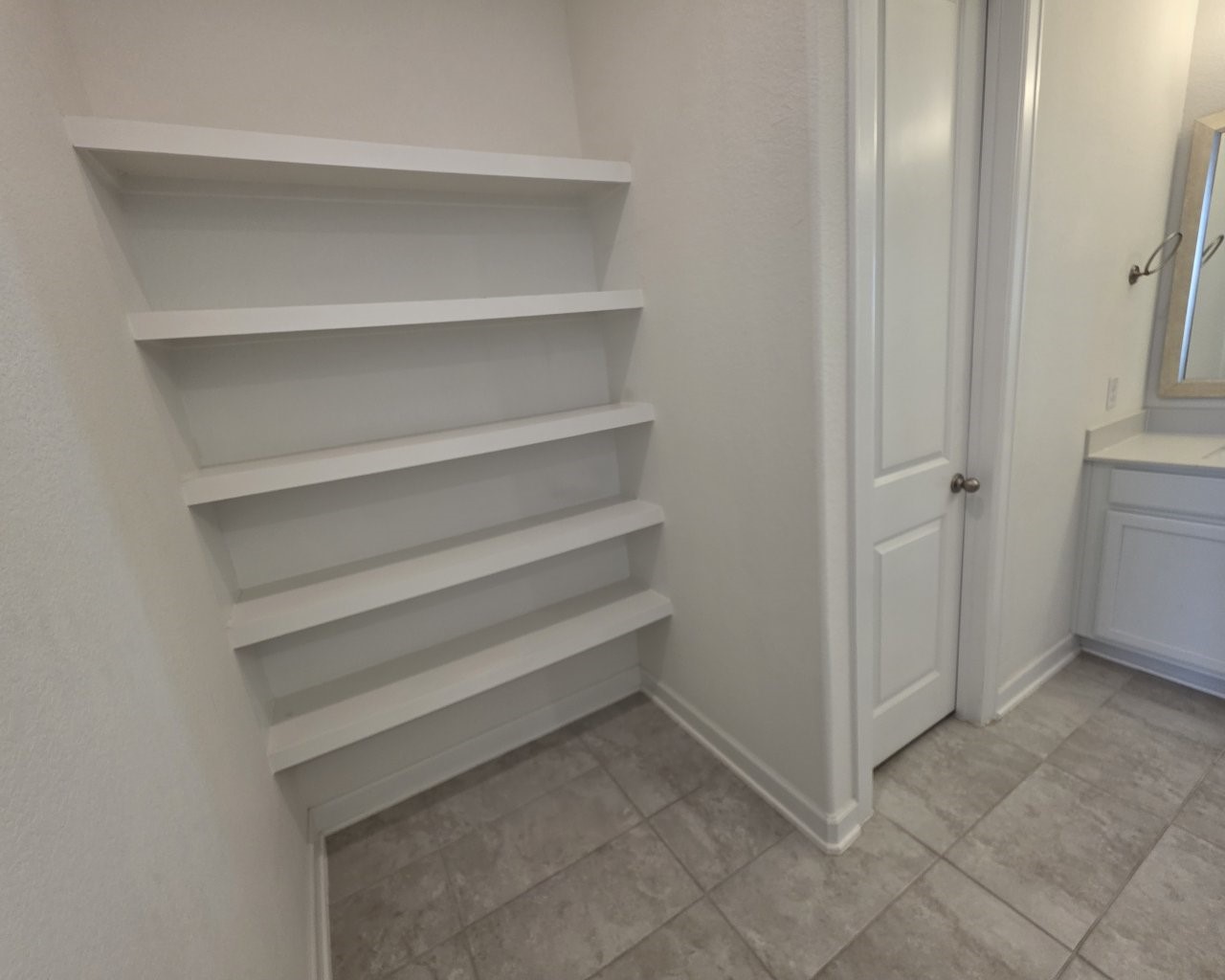 839 Lakeland Circle Rosharon, TX 77583 - Photo 15 of 30 Shelving for linens