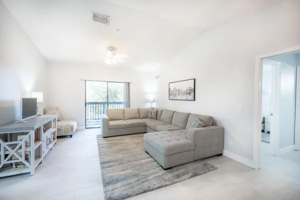 a living room with furniture and a couch