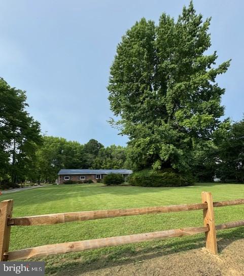 a view of a golf course with a lake