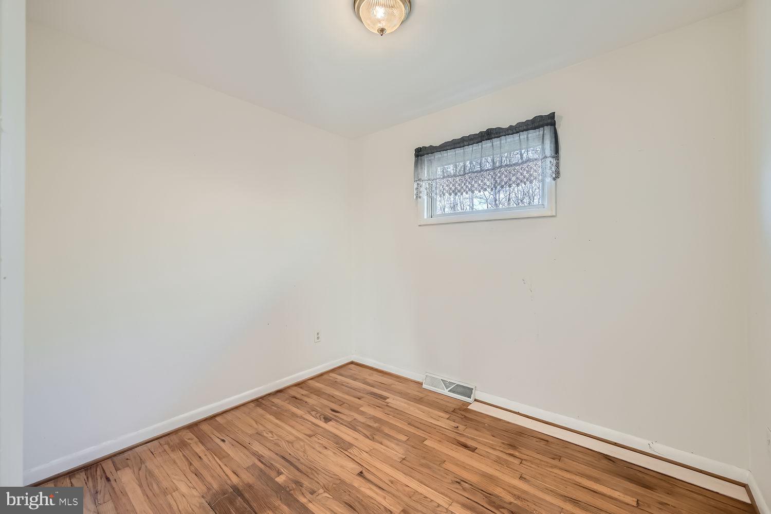 1410 Stepney Road Annapolis, MD 21409 - Photo 16 of 30 a view of a room with wooden floor