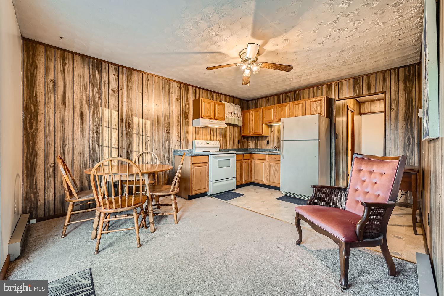 1410 Stepney Road Annapolis, MD 21409 - Photo 24 of 30 a living room with furniture a ceiling fan and a window