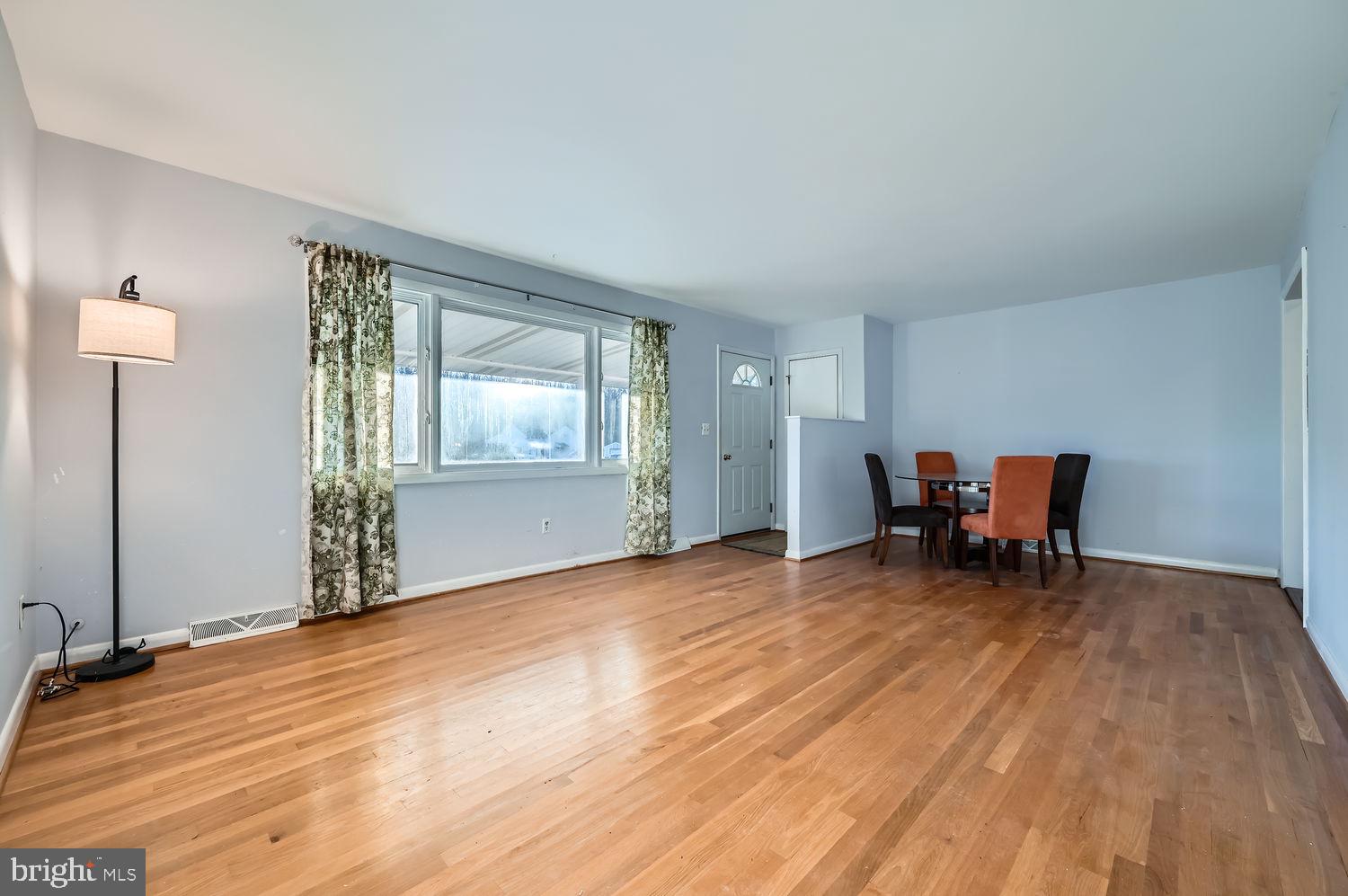 1410 Stepney Road Annapolis, MD 21409 - Photo 10 of 30 a view of a livingroom with wooden floor and a sink