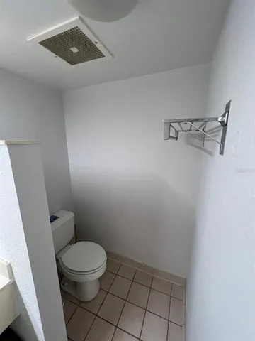 a bathroom with a toilet