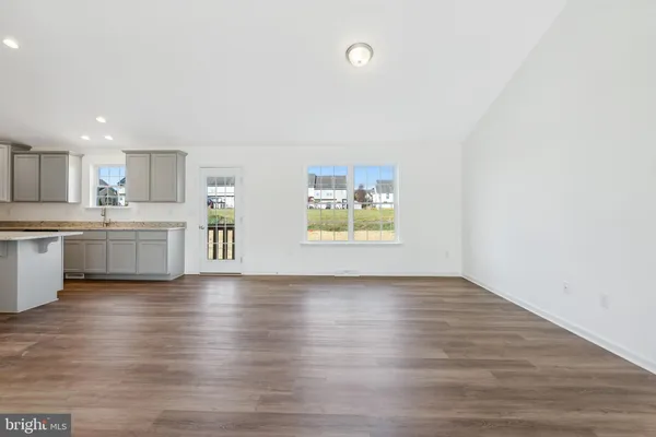 a view of kitchen with wooden floor