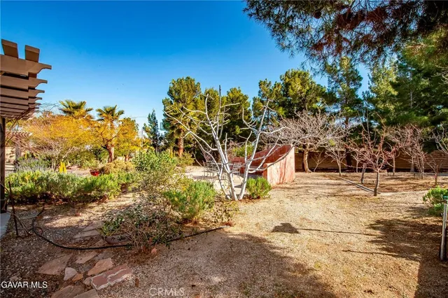 a view of swimming pool with a patio