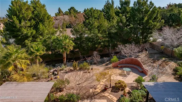 a view of swimming pool with a patio