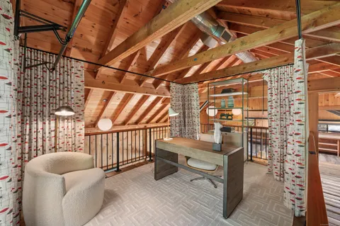 a view of a chairs in wooden deck