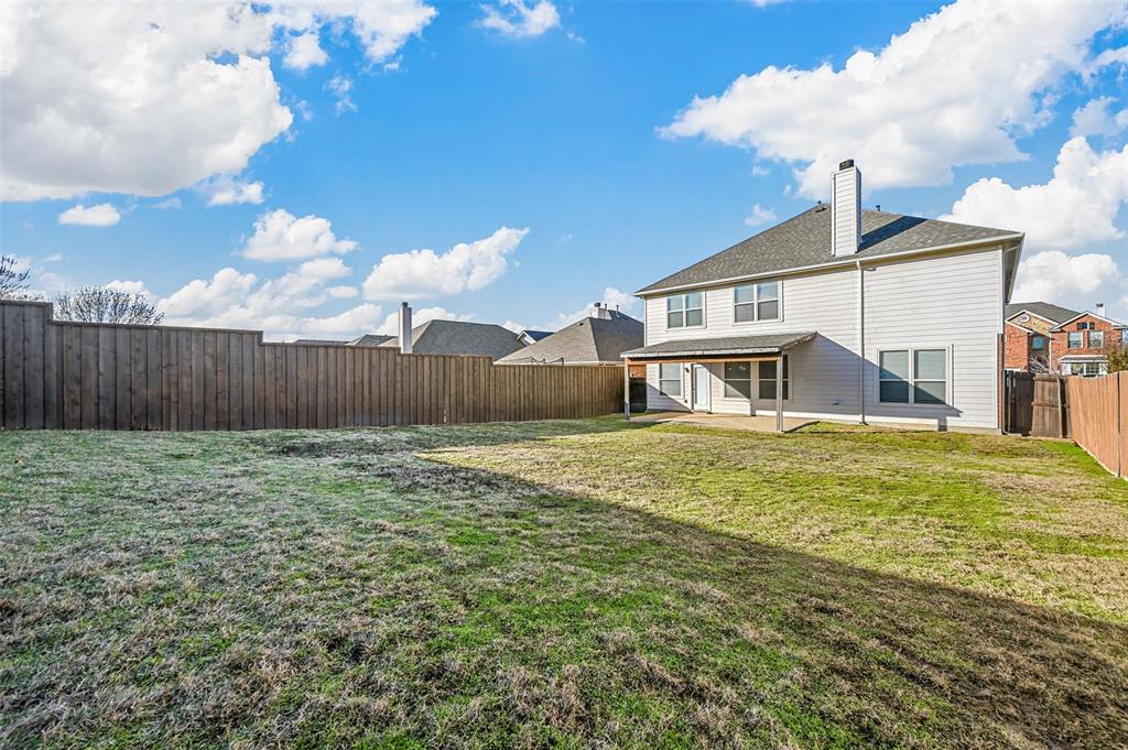 14815 Frisco Ranch Drive Little Elm, TX 75068 - Photo 36 of 40 a view of a house with a backyard