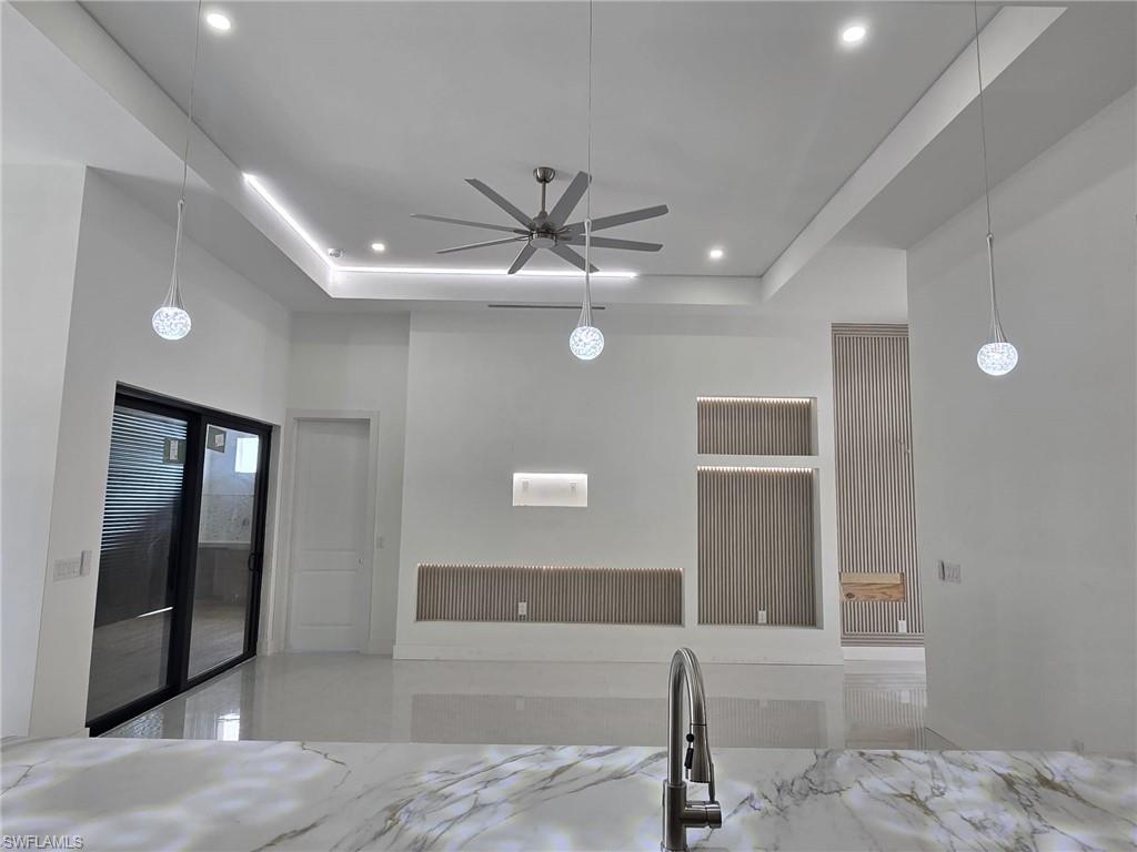 2006 Nelson Road North Cape Coral, FL 33993 - Photo 24 of 50 a view of a livingroom with a ceiling fan