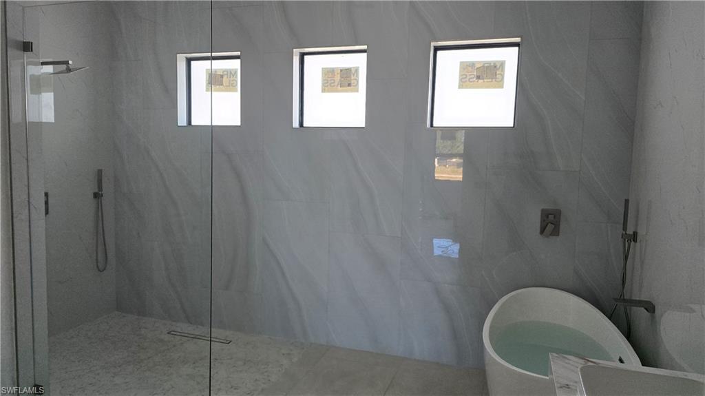 2006 Nelson Road North Cape Coral, FL 33993 - Photo 27 of 50 a bathroom with a toilet