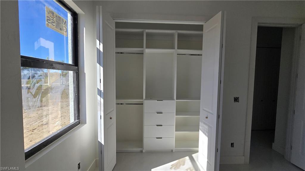2006 Nelson Road North Cape Coral, FL 33993 - Photo 40 of 50 a view of an entryway with wooden floor