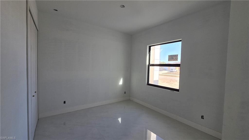 2006 Nelson Road North Cape Coral, FL 33993 - Photo 41 of 50 a view of an empty room with a window