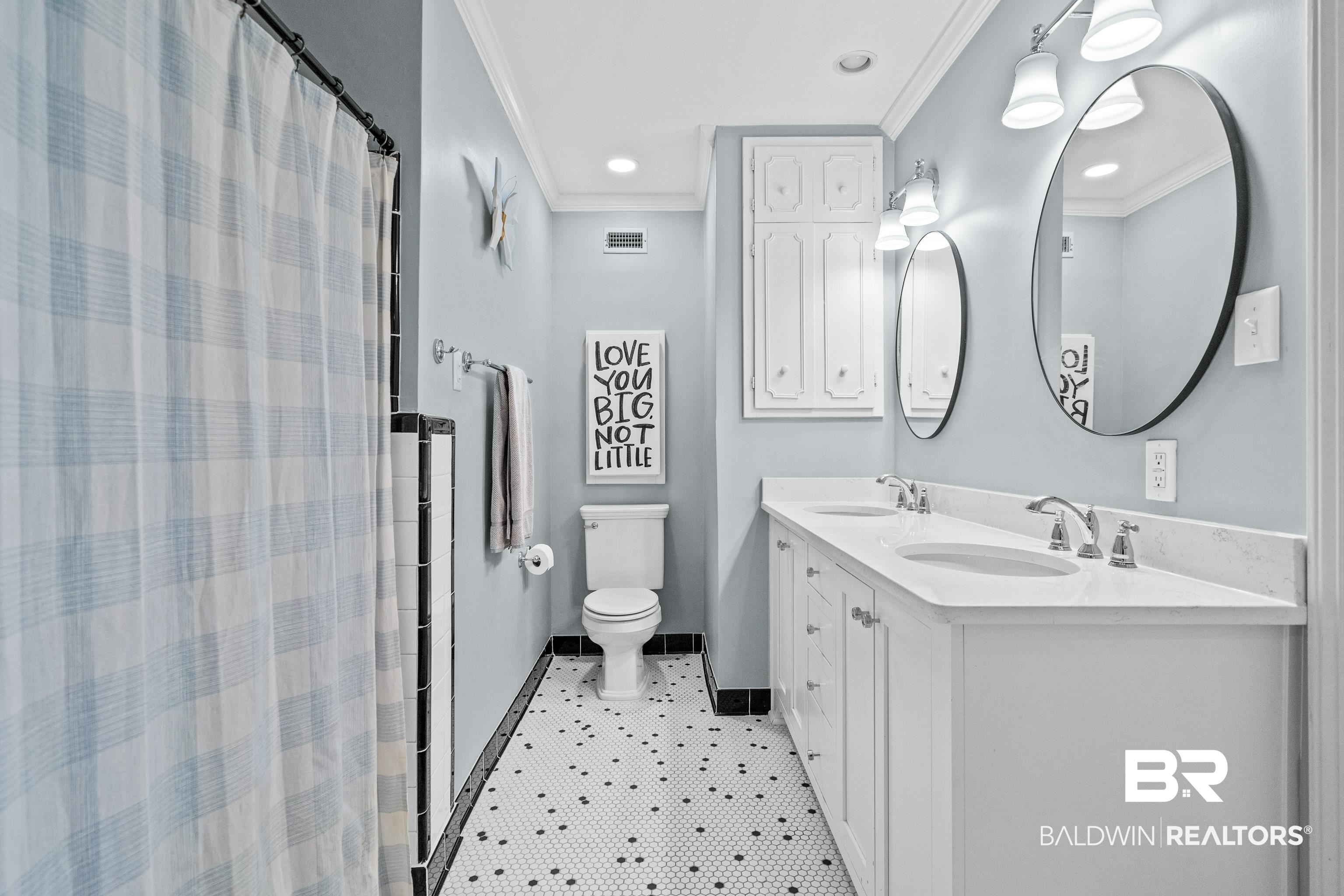 141 Myrtlewood Lane Mobile, AL 36608 - Photo 32 of 44 Bathroom featuring visible vents, toilet, ornamental molding, and a sink