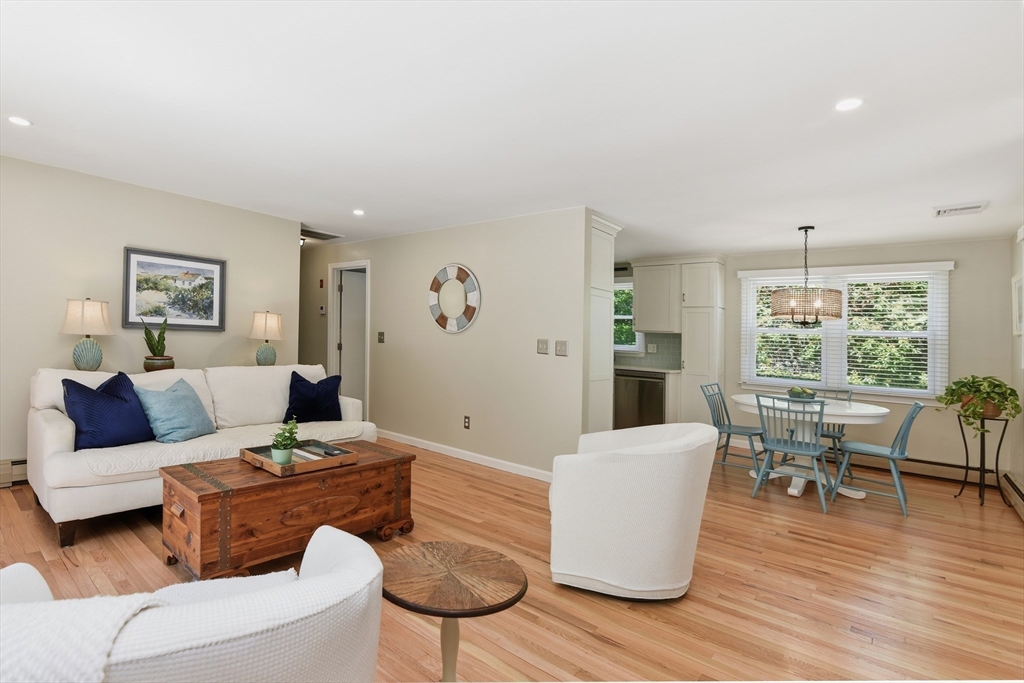 8 Emerald Way Sandwich, MA 02644 - Photo 15 of 36 a living room with furniture and wooden floor