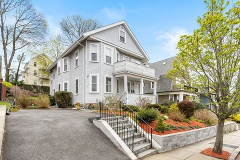 a front view of a house with porch
