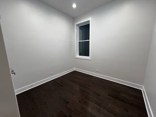 a view of a bathroom from a hallway