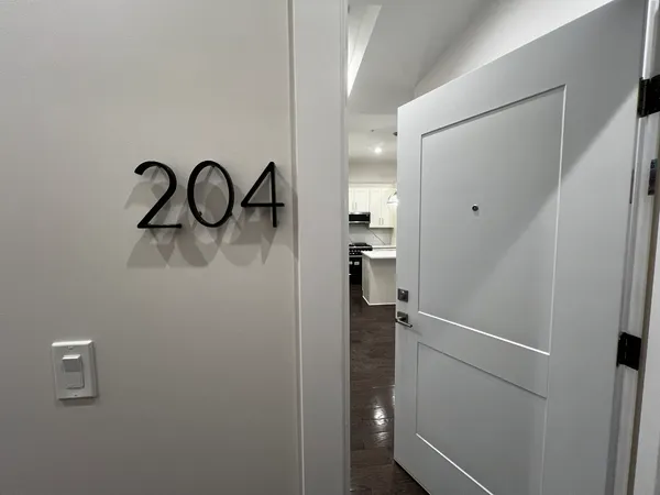 a picture of a room with a white and white walls