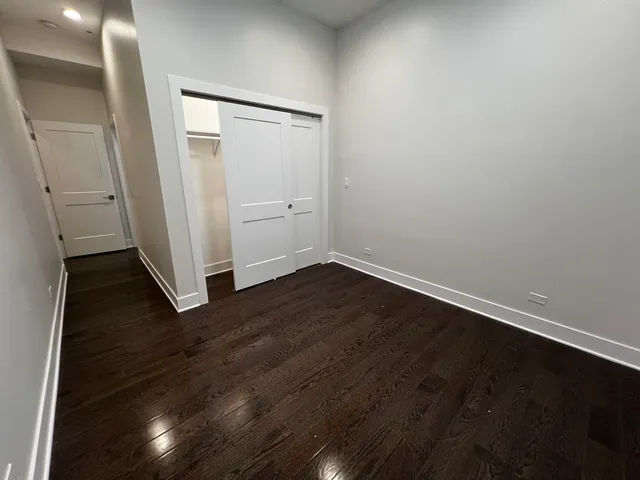 a picture of a room with a white and white walls