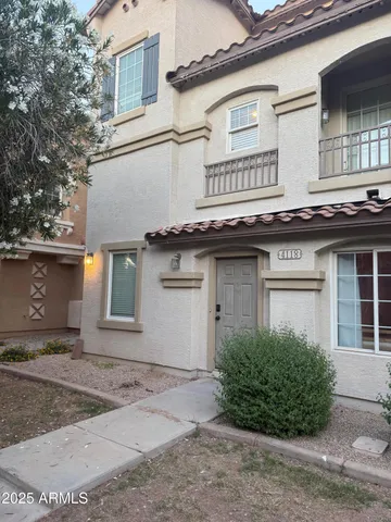 a house view with a outdoor space