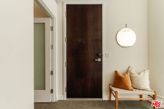 a swimming pool with outdoor seating and yard