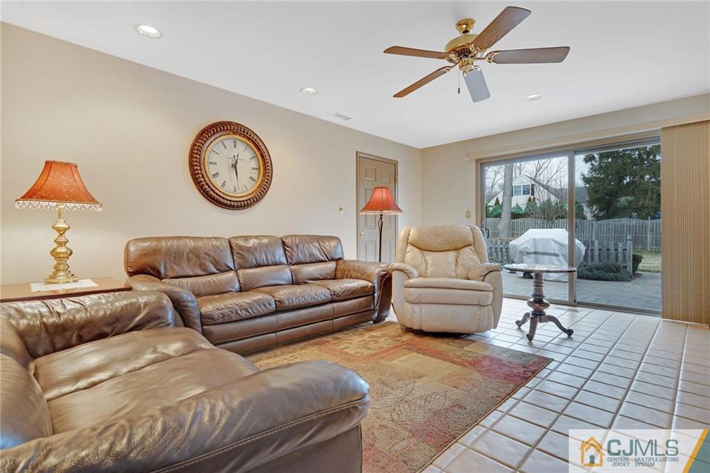 16 Crabtree Road Old Bridge, NJ 07747 - Photo 18 of 25 a living room with furniture and a large window
