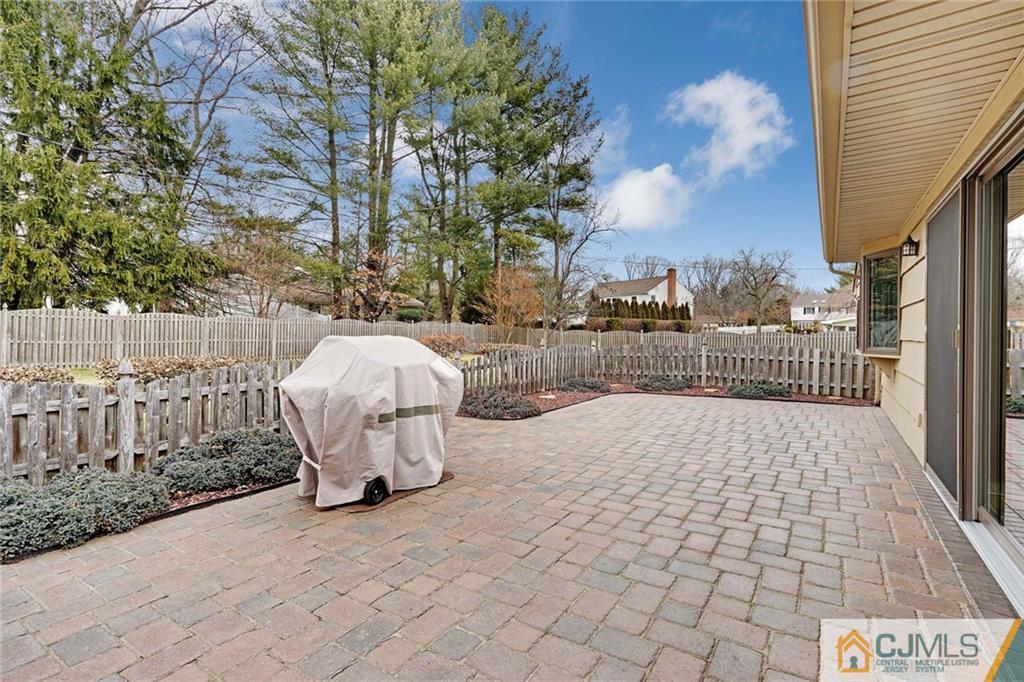 16 Crabtree Road Old Bridge, NJ 07747 - Photo 23 of 25 a front view of a building with iron fence