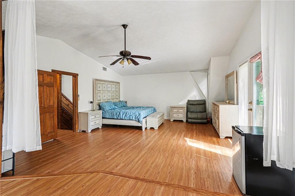 2530 Rockbridge Road Northwest Conyers, GA 30012 - Photo 21 of 45 a living room with furniture and a wooden floor